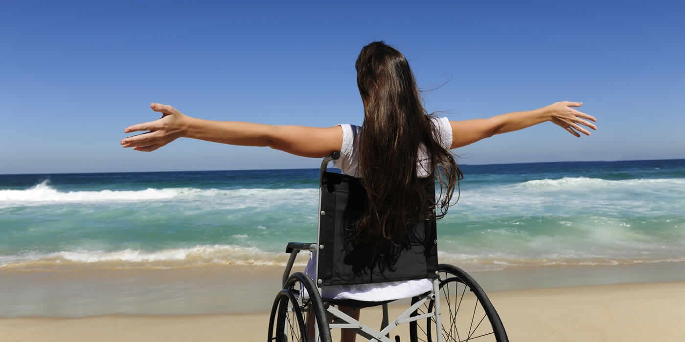 Wheel Chair in the Beach