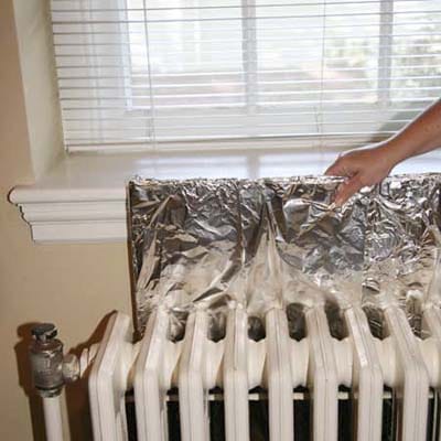 Tin foil at back of radiators