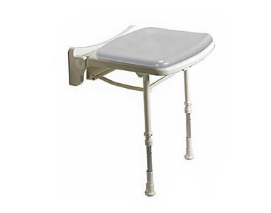 Wall-mounted fold-down shower seat with padded grey seat and two adjustable support legs for added stability.