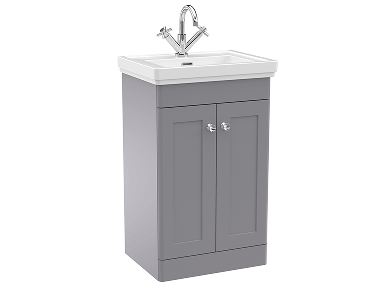 Freestanding light grey bathroom cabinet with two doors beneath a white basin, featuring a silver faucet with cross handles.