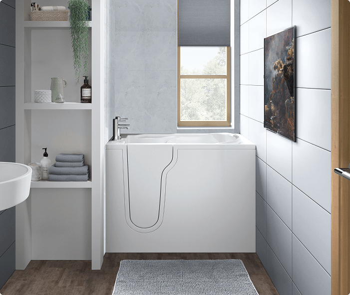 The Derwent bath shown in a bright, modern bathroom. Its sleek shape, inward-opening door and compact profile make it ideal for smaller spaces without compromising on comfort.