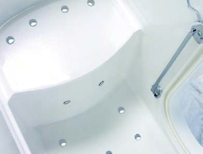 Contoured walk-in bath seat with built-in hydrotherapy jets arranged along the base and backrest for targeted comfort.