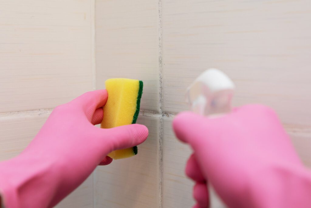 Chemical spray to clean grout from between tiles.