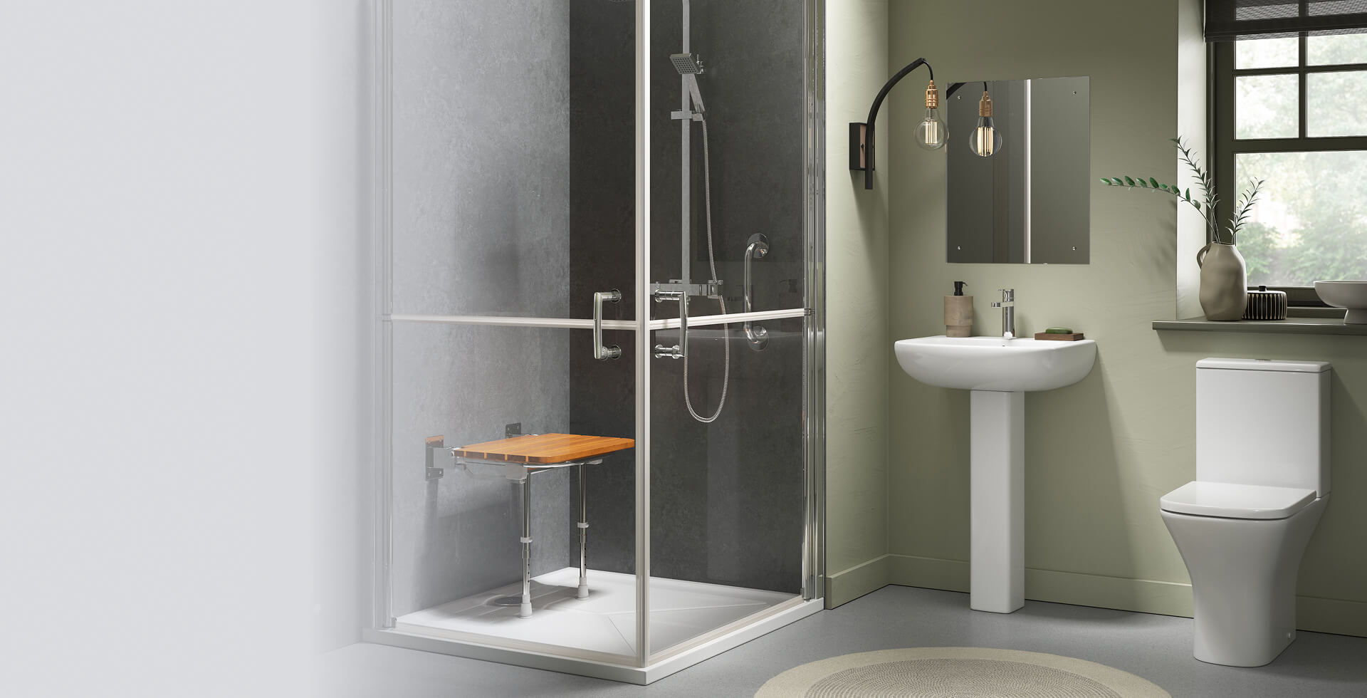 Modern bathroom with a corner shower enclosure featuring full-height bifold glass doors, chrome handles, and a built-in wooden shower seat, next to a pedestal sink and toilet.