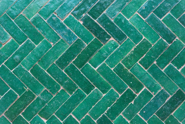Green chevron bathroom tiles